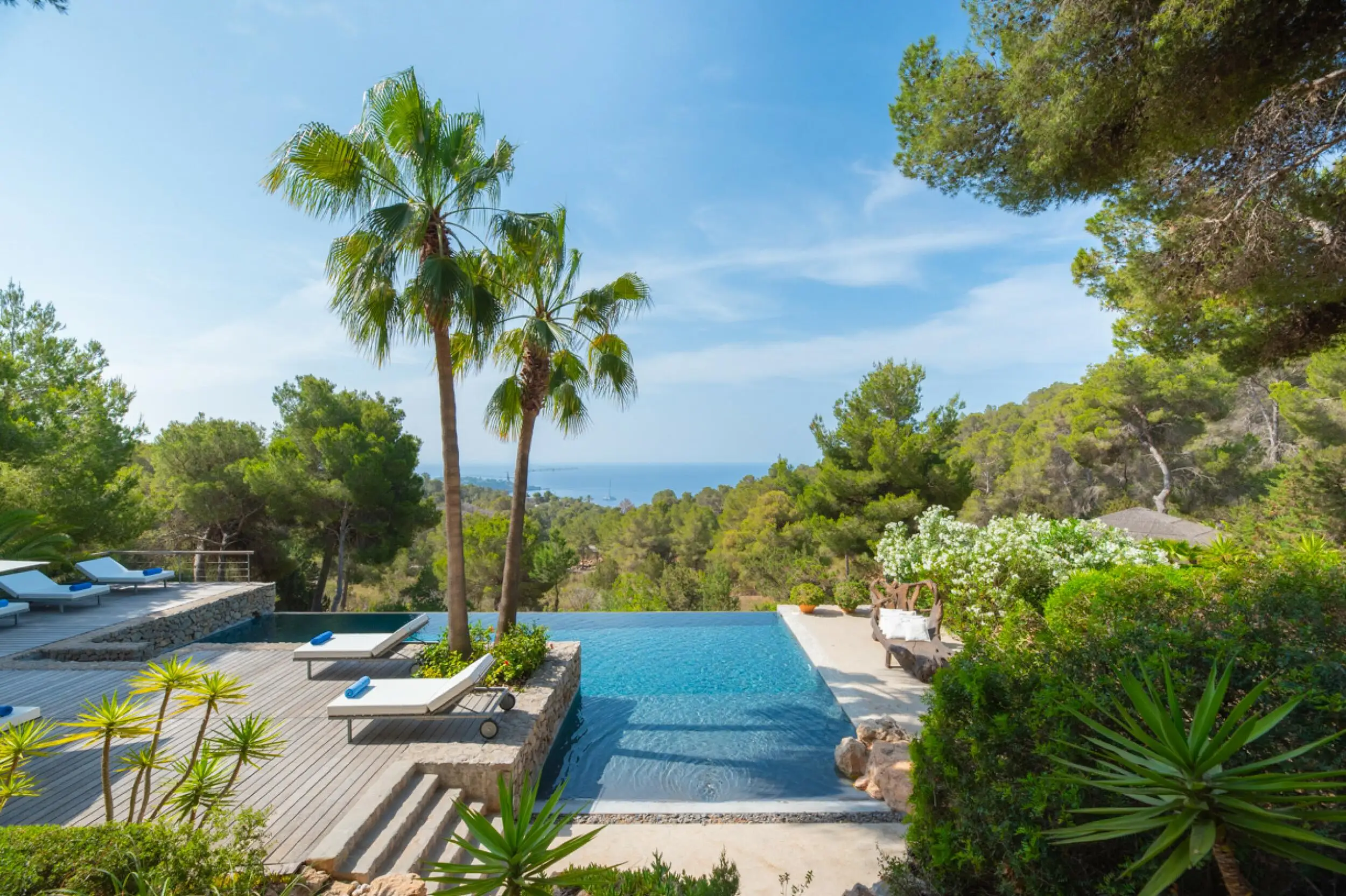 Villa Paradiso is an elegant hideaway in Es Cubells, blending Mediterranean charm with tropical touches and uninterrupted views over Formentera and the Porroig peninsula.